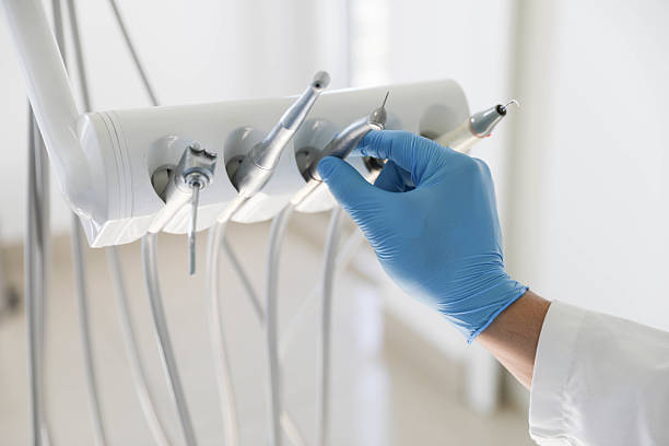 Professional Tooth Extraction technician working in Palisades Park, NJ